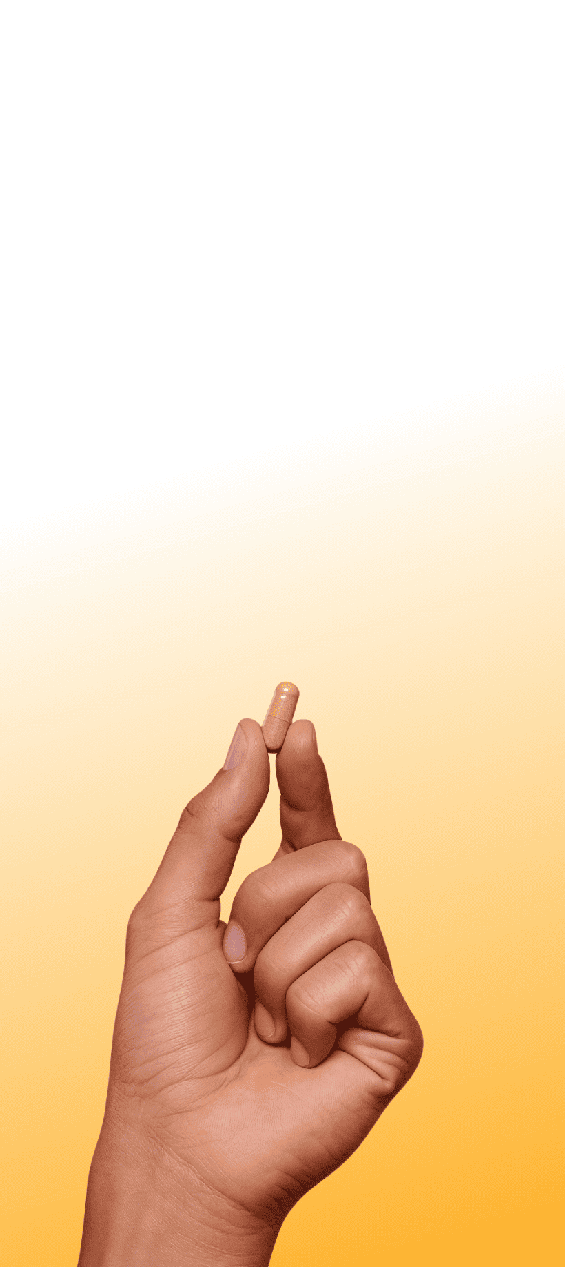 Hand holding LIMITLESS pill